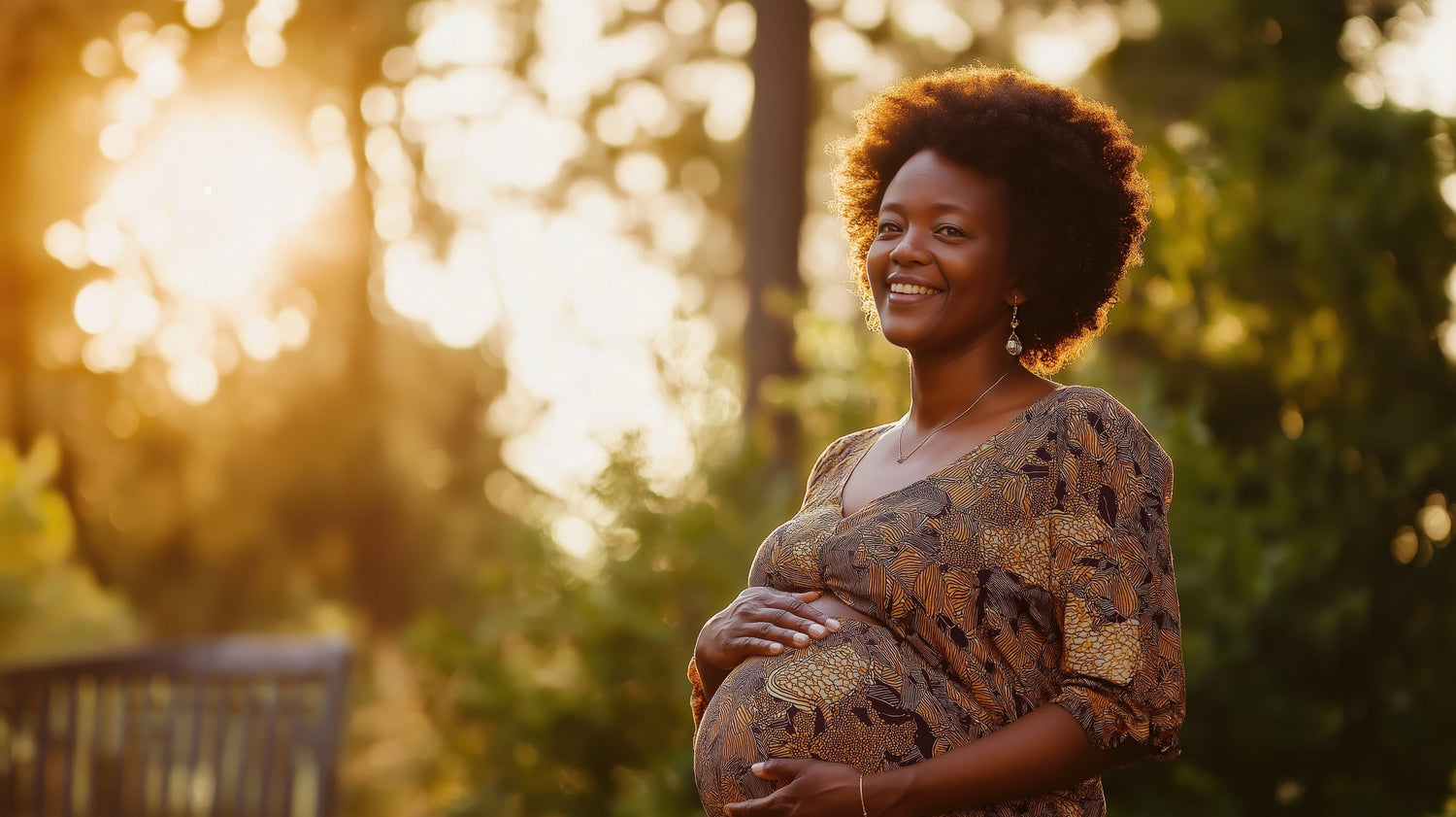 pregnant woman in red cherri underwear holding lotus birth herbs in mason jar on her lap